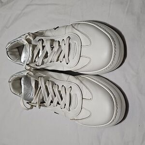 Ed Parrish white trainers.